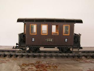 Voiture � essieux marron 300x